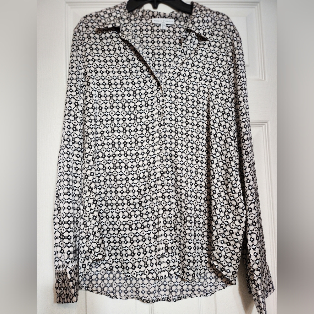 Black, Tan and White Patterned Blouse. 59% Polyester, 38% Recycled Poly, 3% Span